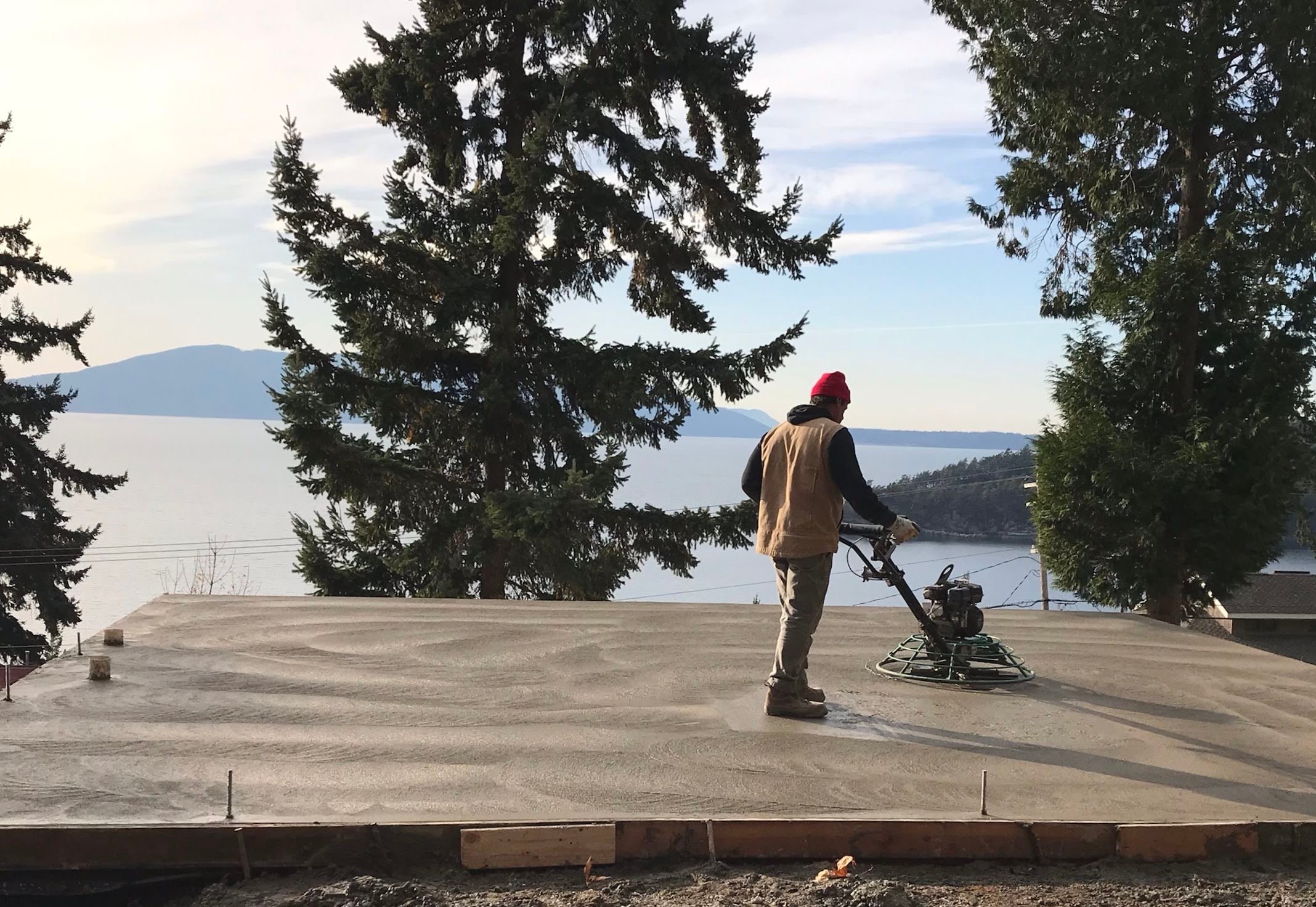 Concrete finishing with power trowel