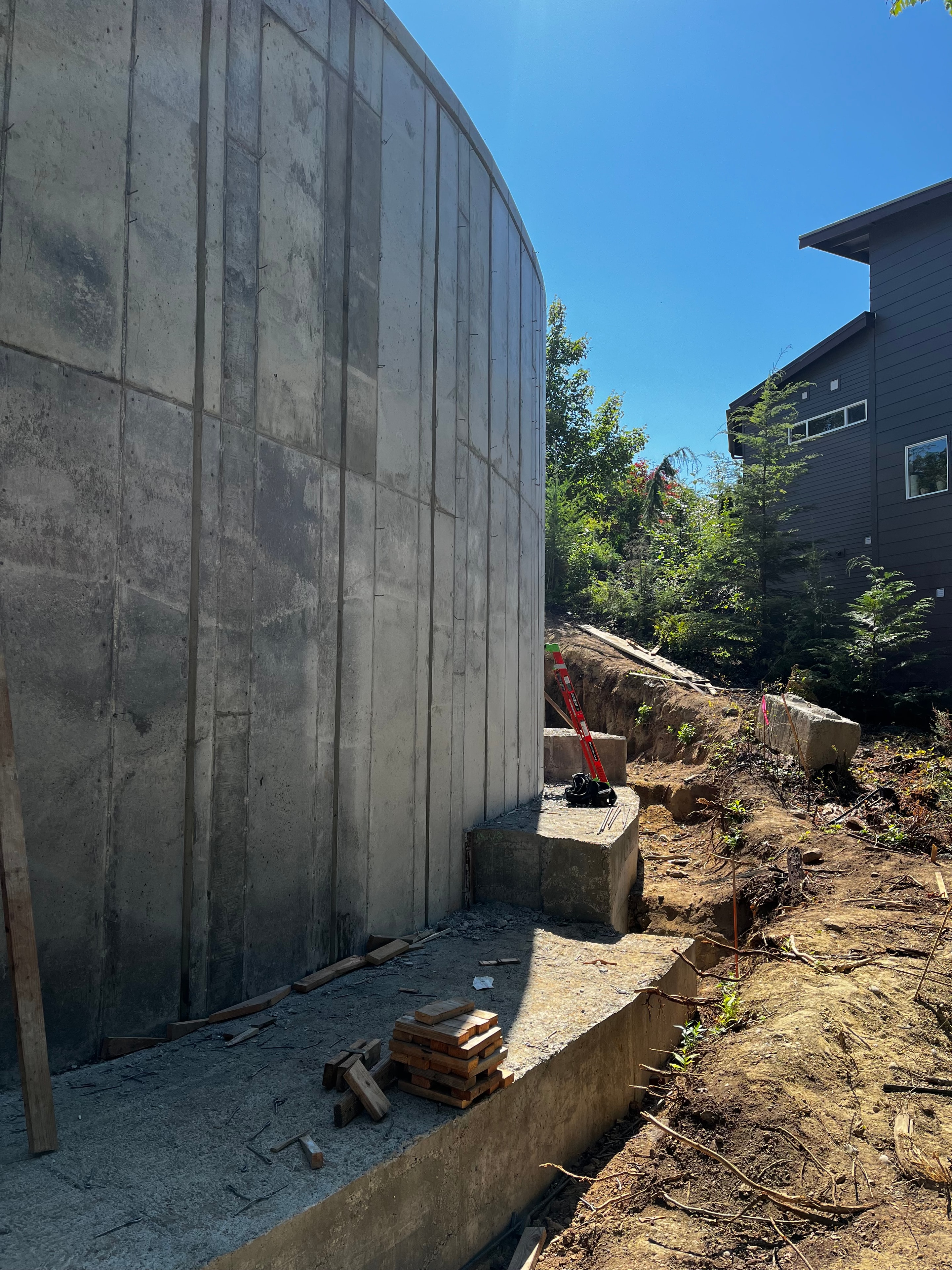 Concrete wall and excavation